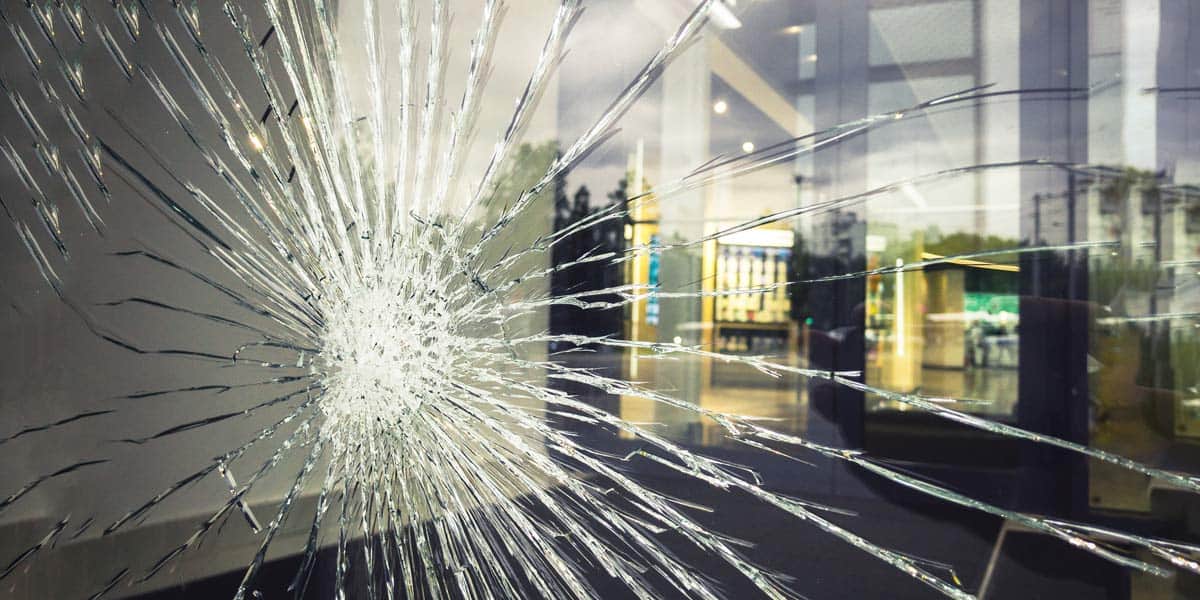 How does security window film for commercial buildings work?